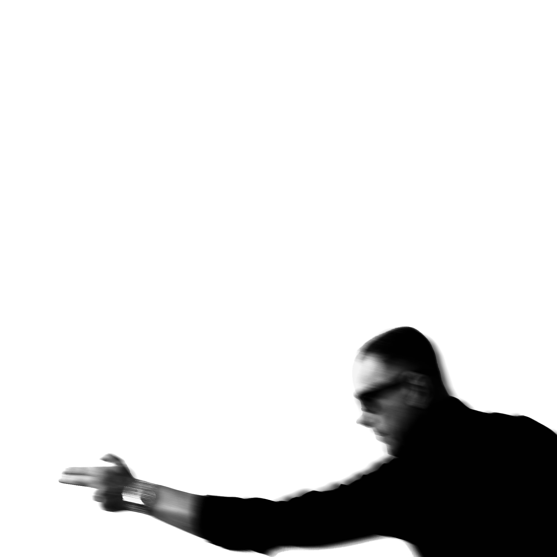 Blurred monochrome figure reaching forward — photograph by Apollona7